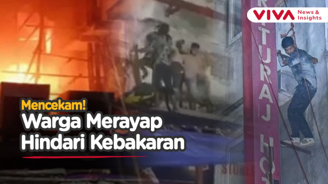 Warga Bak Spiderman Merayap ke Luar Gedung Terbakar